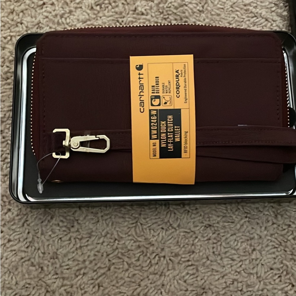 Brand new carhartt wallet. Will fit most smartphones